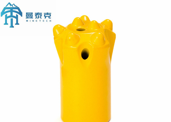 石訓練および発破用具によって先を細くされたボタンは36mmを11度かんだ